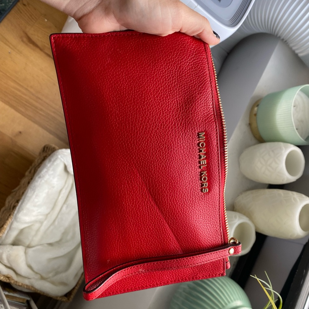 MK wristlet (crease in it)